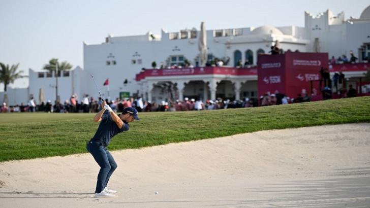 Matthew Jordan playing towards the 18th green at the Qatar Masters